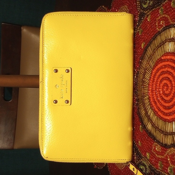 kate spade Handbags - Kate Spade Kaden Leather Wallet Yellow